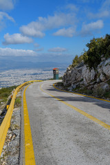 Hymettus (Ymittos) mountain road with yellow barriers