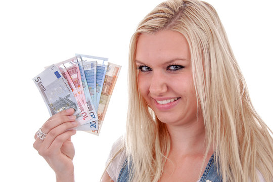 Young blonde woman is holding European money over white background