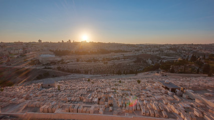 Jerusalem panorama view over the City at sunset timelapse with the Dome of the Rock from the Mount of Olives.