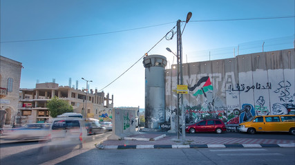 The Israeli West Bank barrier is a separation barrier timelapse hyperlapse. Bethlehem, Palestine.