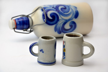 bottle and beer glasses ceramic beer mugs