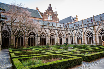 Fototapeta na wymiar Utrecht, Netherlands - January 06, 2020. Pandhof garden of the Dom Church is one of Holland most beautiful inner courtyards