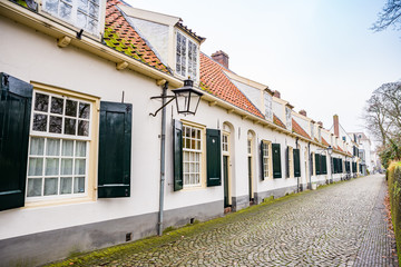Fototapeta na wymiar Utrecht, Netherlands - January 07, 2020. Row houses originally built for widows