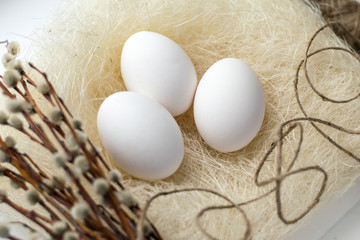 Easter Orthodox Palm Sunday eco chicken eggs natural hay and straw background place for an inscription