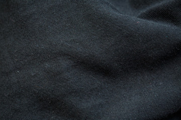 Fototapeta na wymiar Thick black fabric for clothes and decor