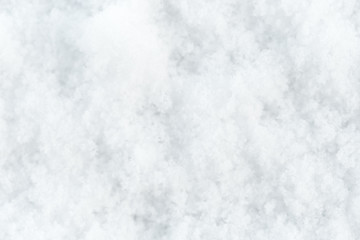 Texture of natural snow. Top view of the snow.