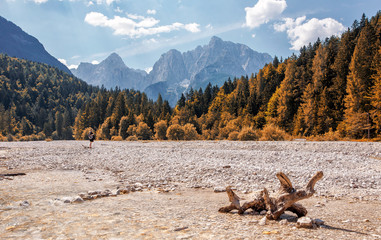 Wonderful landscape of Triglav National Park in sunny day. Majestic Mangart Mount near Jasna lake....