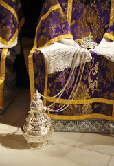 Liturgical objects exhibited in Holy Week in Triana, chasubles, censer, Seville, Spain