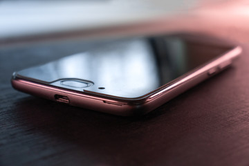 Smartphone wallpaper with red and blue lighting. Partially focused photography