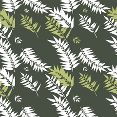 Seamless graphic pattern with the image of white and gold palm leaves on a black background. Vector illustration