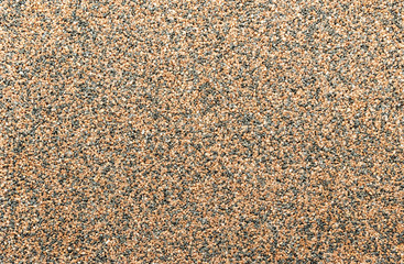 Decorative pebbles. Background and texture of brown and black pebbles.