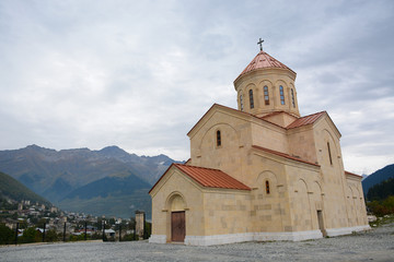 Fototapeta premium Mestia, Georgia - October 2, 2018: Orthodox church on the way to Hatsvali cable car in Mestia, Svaneti