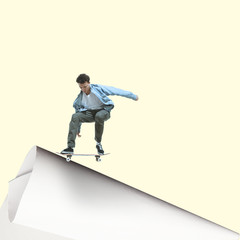 Imagine who's covering white sheet to get digital file icon. Young man, professional scater catching the edge of huge paper sheet. Digital world, funny imagination of the way the shout appearing.