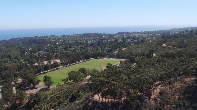 Tilt up aerial, polo field in California