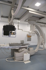 Angio lab in a hospital with diagnostic imaging equipment used to visualize the arteries and the chambers of the heart