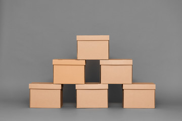 Cardboard box on gray background with copy space.