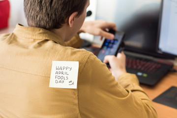April 1 is day of fools.Funny day.April fish.Practical jokes.Inscriptions on the back.Stickers with jokes.Trick at work. Cheerful colleagues.Glued leaf on back.Colored stickers with inscriptions.