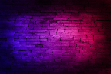 Naklejka na ściany i meble Neon light on brick walls that are not plastered background and texture. Lighting effect red and blue neon background of empty brick basement wall.