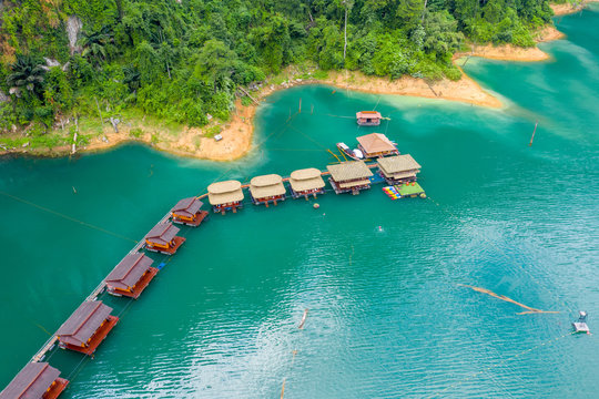 Aerial view of The Greenery Panvaree resort floating house at Khao sok lake
