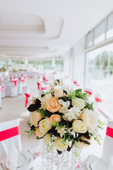 Coziness and style. Modern event design. Table setting at wedding reception.