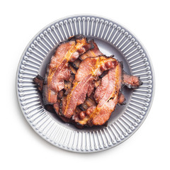 Fried bacon. Sliced roasted bacon.