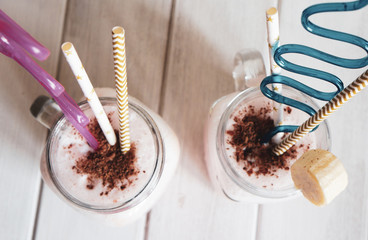 milk shake, chocolate crumb banana slice and straws, healthy and healthy