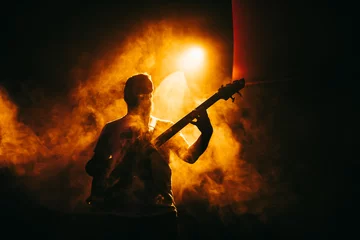 Deurstickers Guitarist guitar player on stage rock acoustic perform © ramoshots
