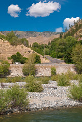 Mountain Landscape Over River and a Fragment of Road.