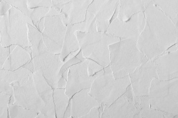 Glued pieces of white paper close-up. Texture for design.