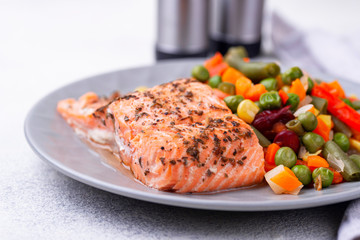 Baked salmon with boiled vegetable