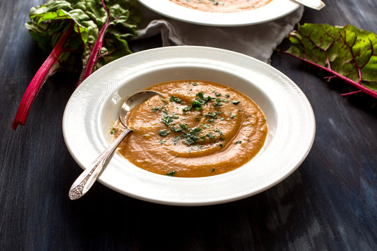 Chard stalk, celeriac and leek soup on table