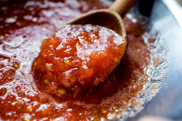 Spicy tomato sauce prepared in wok