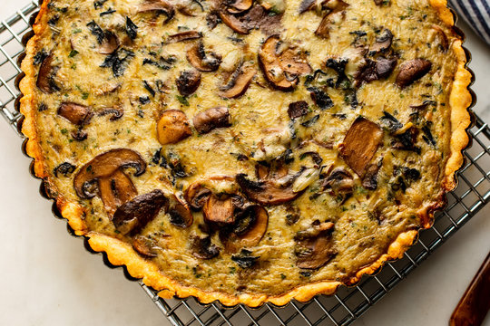 Close up of mushroom ragout tart on cooling rack