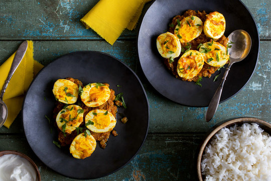 Eggs in spicy tomato sauce