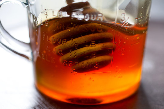 Honey with honey dripper