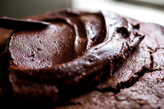 Close up view of icing or frosting chocolate cake