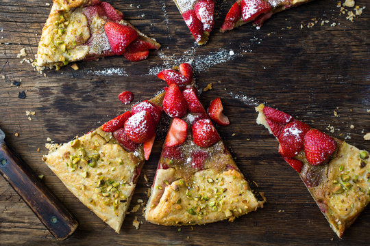 Sweet strawberry galette placed on table