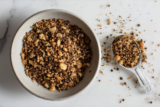 Overhead view of hazelnut dukkah served in bowl