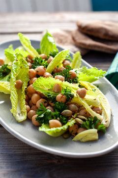 Tilt shift view of romaine salad with chickpeas
