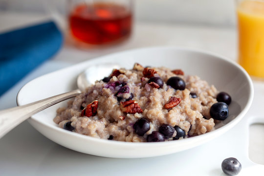 Tilt shift view of bulgur with blueberries and pecans