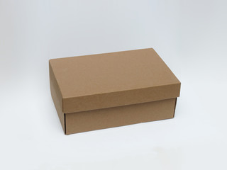 Box with a lid on a white background. Paper gift box on isolated background.
