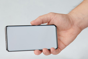 Hand show smartphone horizontal