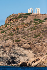Temple of Poseidon, archaeological site of Sounion, Cape Sounio, Greece. View from the Myrtoan/Mediterranean sea level