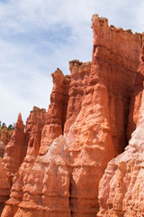 Bryce Canyon, Utah National Park. Incredible mountain landscape of American nature. Traveling in America, a tourist place trekking. Walking trip. Layout for design, copy space, sky with clouds.