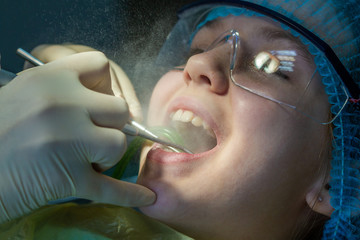 A child at the dentist's appointment. Dental treatment and brushing in the doctor’s office....