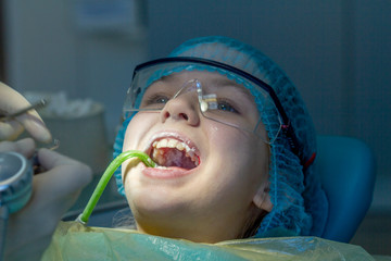 A child at the dentist's appointment. Dental treatment and brushing in the doctor’s office....