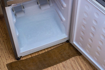 frozen ice on the inside of the refrigerator chamber with the "no frost" system