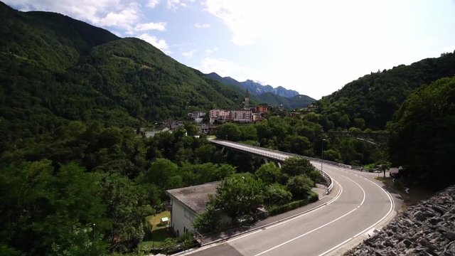 View from scenic Centovalli Railway Locarno to Domodossola train. Swiss Alps. Slow motion. Ticino, Switzerland summer tourism. 