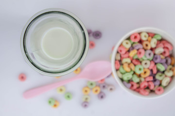 Obraz na płótnie Canvas Jug of milk next to unfocused fruit cereal