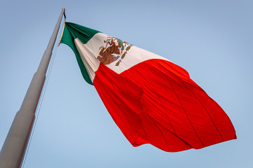 Mexican flag waving in the air
